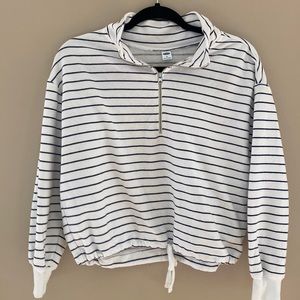 Blue and white striped sweatshirt.